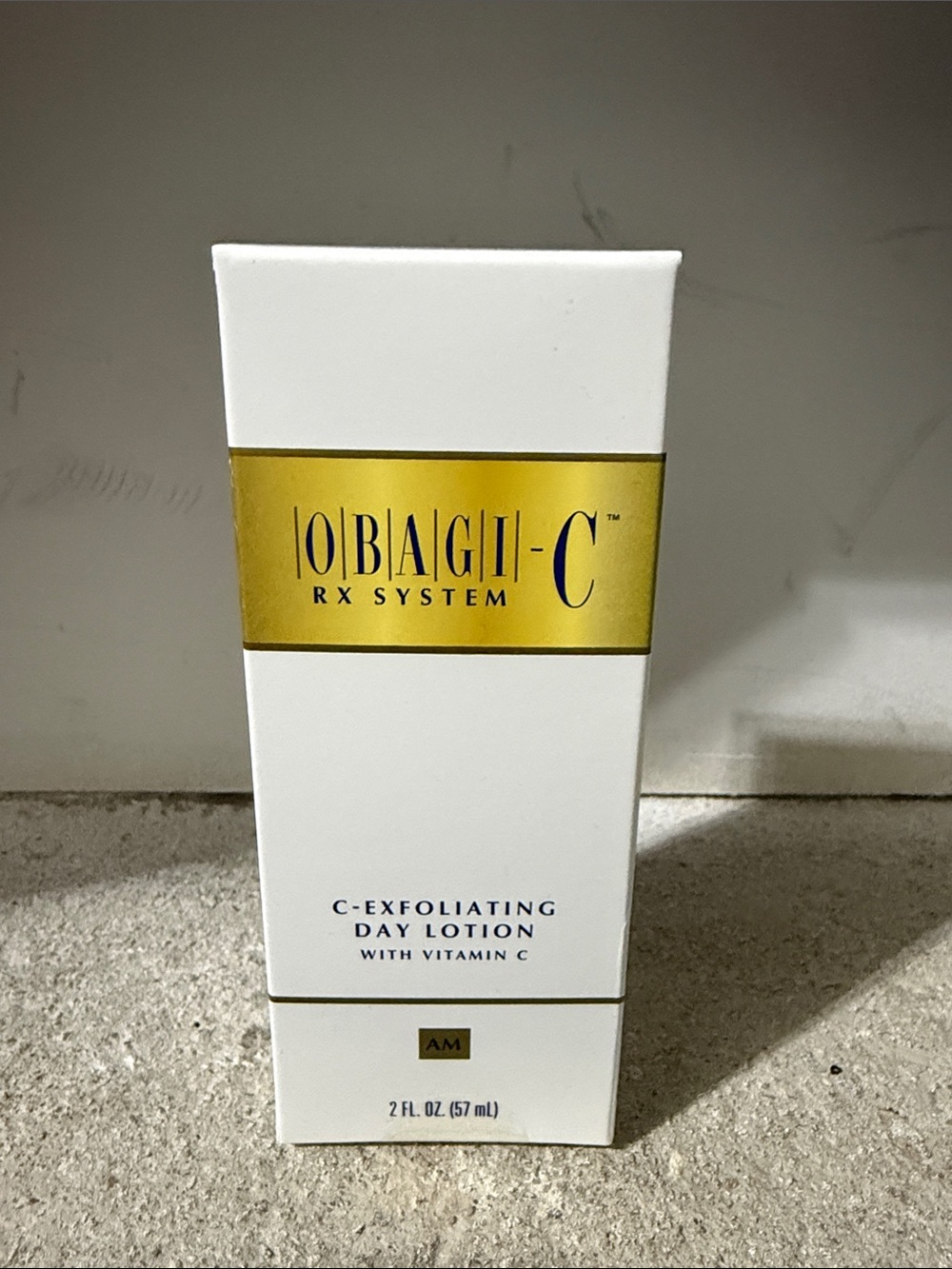 Obagi C-Exfoliating Day Lotion in White and Gold Packaging